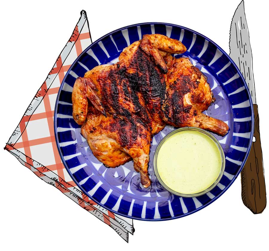 grilled chicken with sauce, knife, napkin