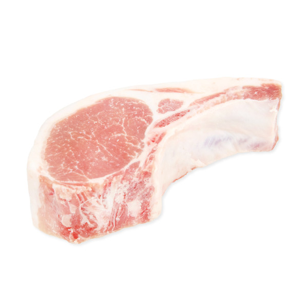 Whole, raw, Kurobuta pork rib chop on white background