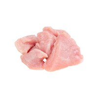 Raw pieces of grain-fed veal stew meat on white background