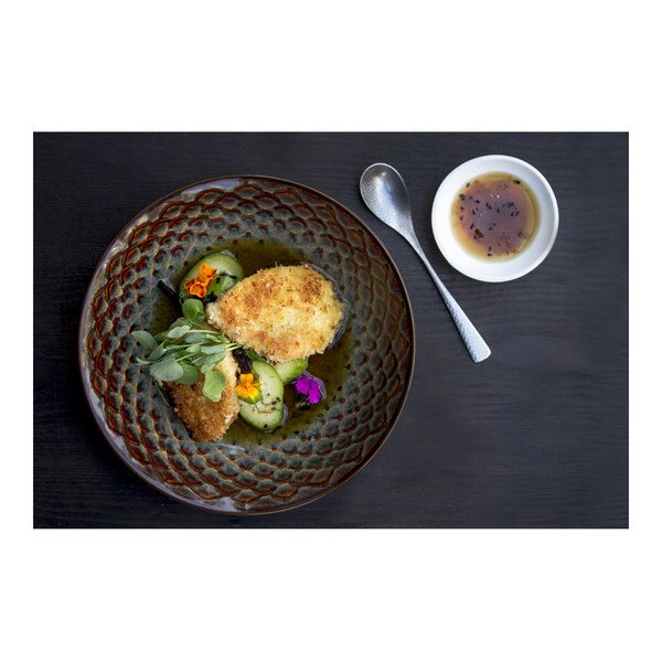 Breaded & fried pieces of alligator sirloin tail meat, cucumber & seaweed salad, ponzu sauce, pea shoots, micro flowers, rippled blue & brown bowl