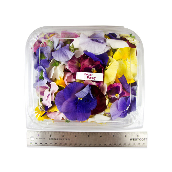 several multi-colored fresh edible pansy blossoms in a clear plastic package