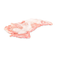 One raw Spanish Iberico pork secreto (boneless shoulder muscle) on a white background