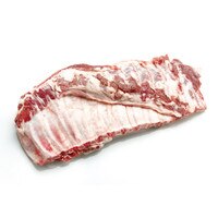 Raw rack of Iberico pork spare ribs on white background