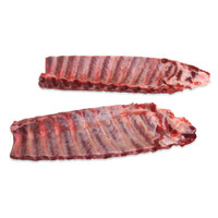 2 raw racks of Kurobuta pork baby back ribs on white background