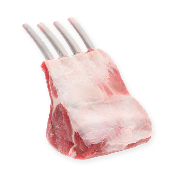 Raw 4-rib rack of grass-fed lamb with frenched bones on white background