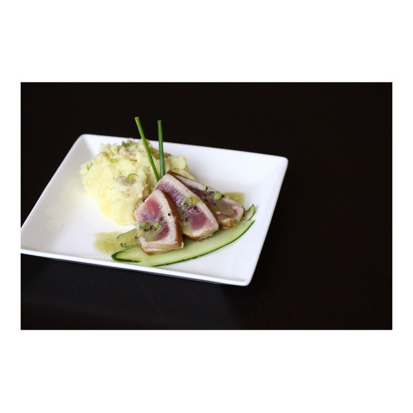 3 slices seared yellowfin ahi tuna, chopped green onion, wasabi vinaigrette, smashed potatoes & sliced cucumber