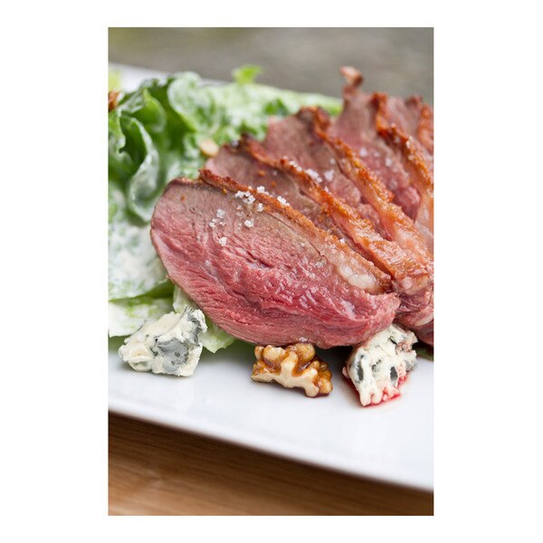 Seared boneless goose breast with apple, blue cheese & candied walnut salad