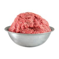 Raw ground bison mounded in metal bowl on white background