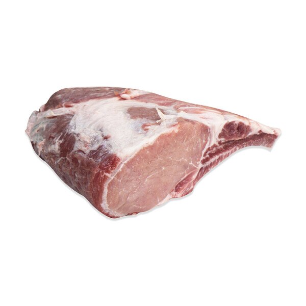 Whole, raw Kurobuta pork rack on white background