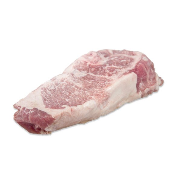 Whole, raw, boneless Kurobuta pork loin chop on white background