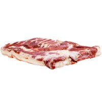 Raw, rectangular slab of Kurobuta bacon on white background