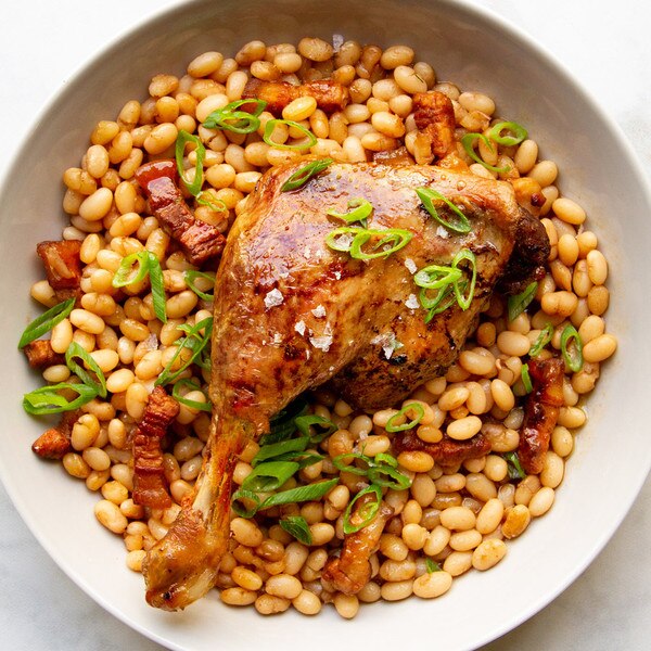 Magret Duck Leg confit over beans