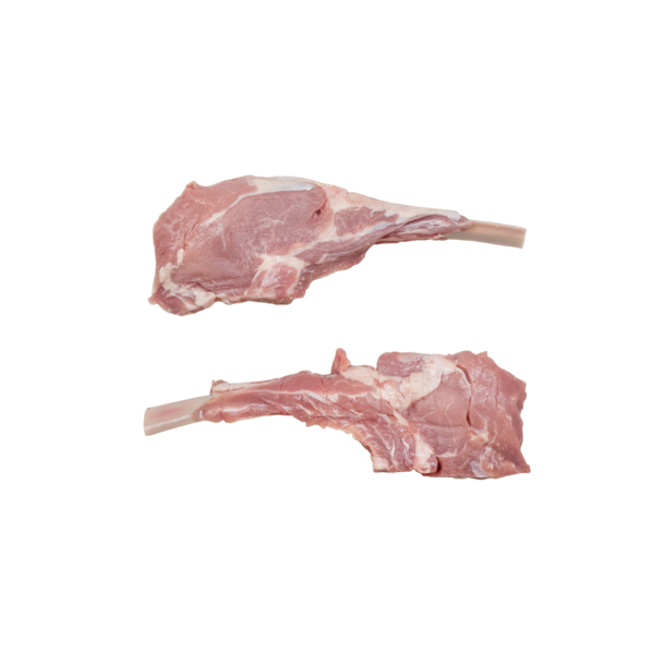 Two raw, milk-fed French veal chops for Milanese on a white background.