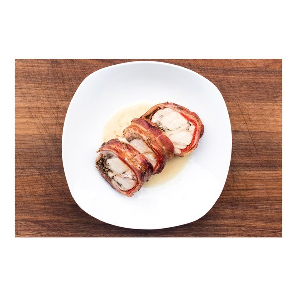 Bacon-wrapped rabbit roulade with mushroom duxelles, peppers & cream sauce, recipe