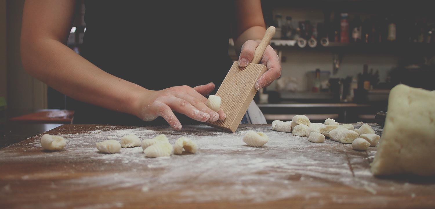 Chef preparing lamb shank recipe and striploin cuts